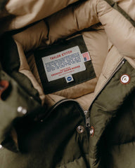 The Down Sweater in Olive Waxed Ripstop